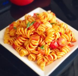 pasta,tomato pasta,creamy tomato pasta,how to make tomato pasta,italian food,italian,cream,tomato,tangy tomato pasta,rotini pasta,cherry tomato,tomato sauce,tomato pasta,rotini tomato pasta