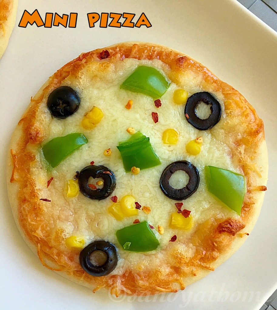 Mini pizza recipe, How to make mini pizza - Sandhya&amp;#39;s recipes