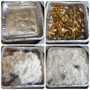 tranferring the vegetables and rice to baking tray for baked vegetable biryani