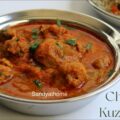 Rustic Muslim-style chicken kuzhambu in clay pot with curry leaves and coconut masala, served hot for Bakrid