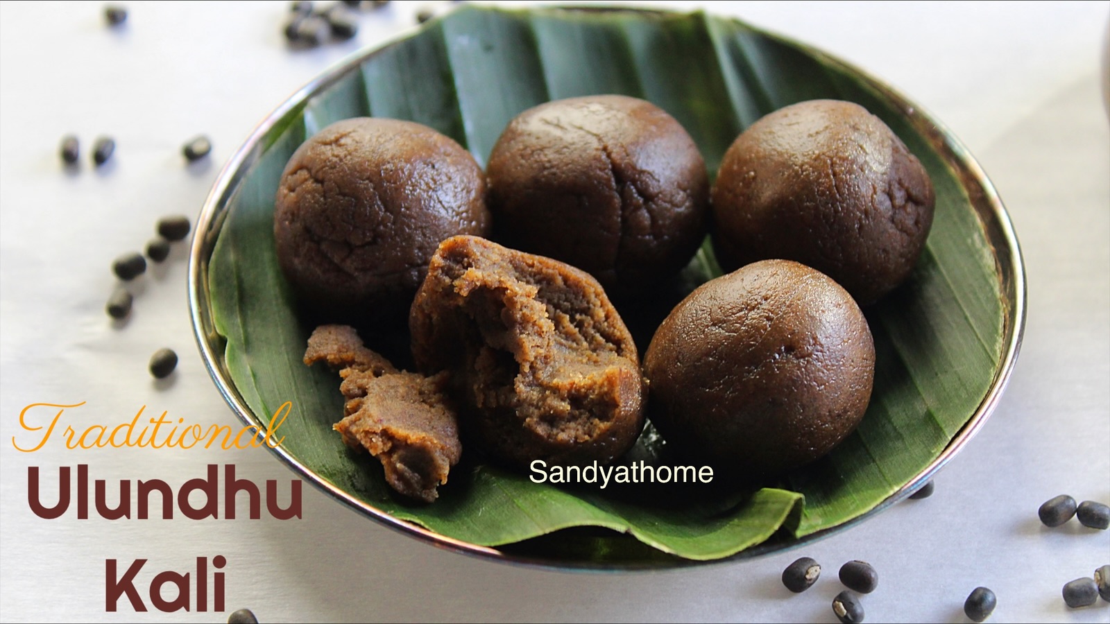Glossy ulundhu kali ball plated on fresh banana leaf – a revival Tamil sweet