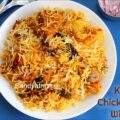 Kolkata chicken biryani with fried potatoes and a halved boiled egg, showcasing the Nawabi-style presentation.