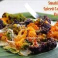 Swahili-inspired Indian fusion dish featuring roasted colorful cauliflower on banana leaf, served with creamy cashew curd white sauce; healthy Trader Joe’s cauliflower recipe with spices like cumin and garlic, plated as a vibrant African Indian appetizer or starter.