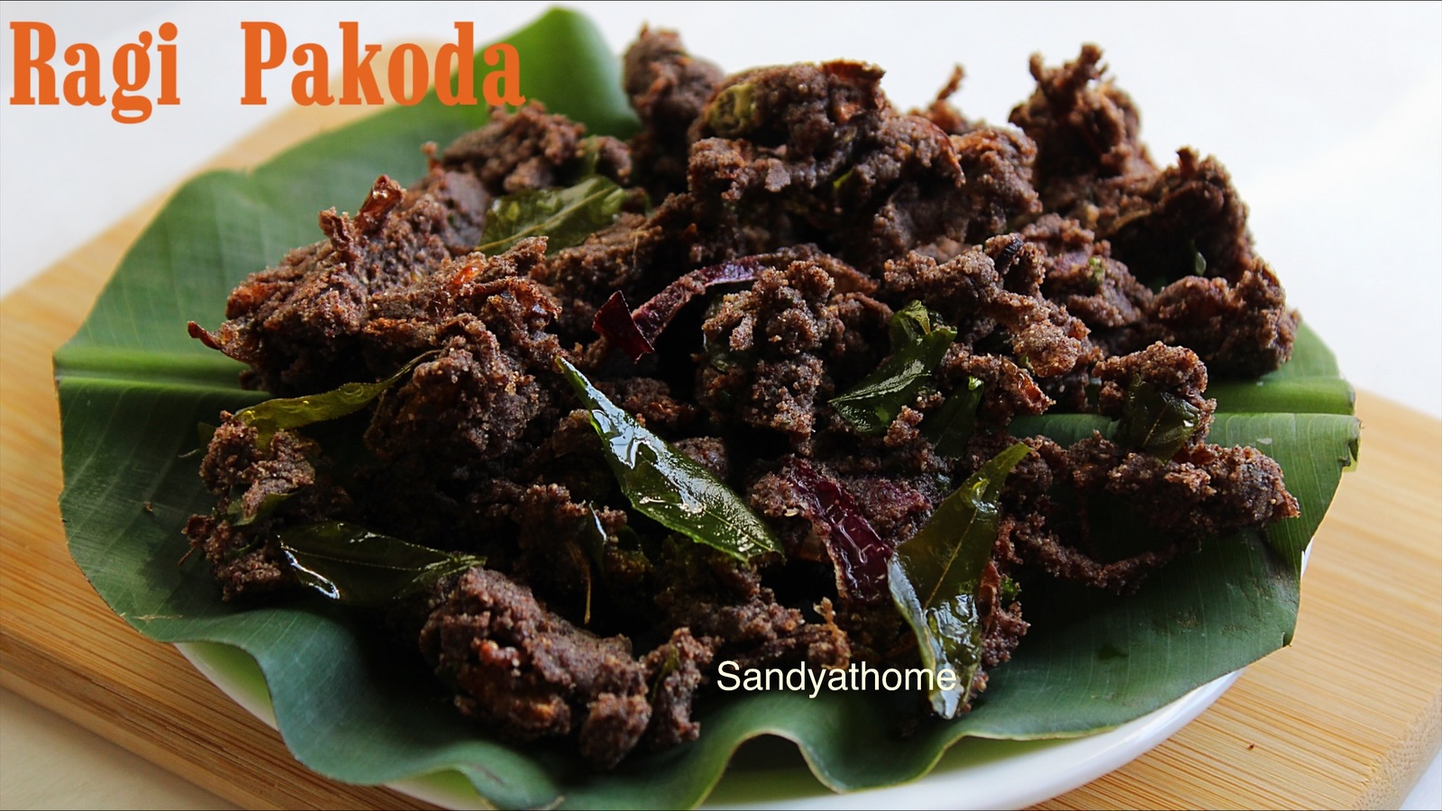 Ragi onion fritters made with millet flour and onions — a wholesome and traditional gluten-free Indian snack option.