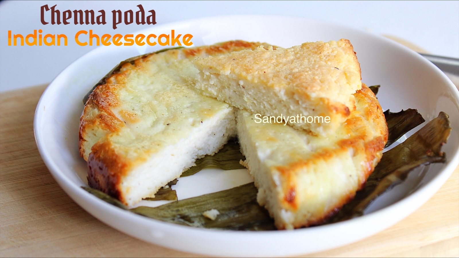Homemade Chenna Poda sweet wrapped and baked in banana leaf — easy Indian dessert using chenna, sugar, and cardamom.