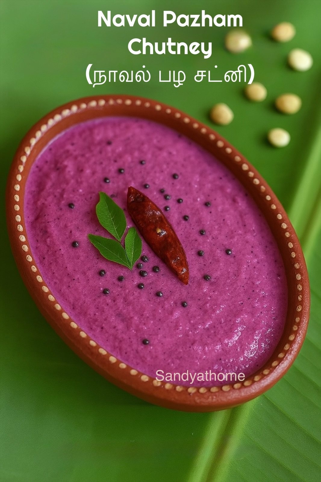 A bowl of vibrant purple naval pazham chutney served on a banana leaf – traditional Tamil chutney recipe made from jamun fruit.