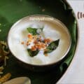 Close-up of savory nungu curd pachadi with mustard, cumin, and curry leaf tempering – a simple South Indian side dish for summer meals.