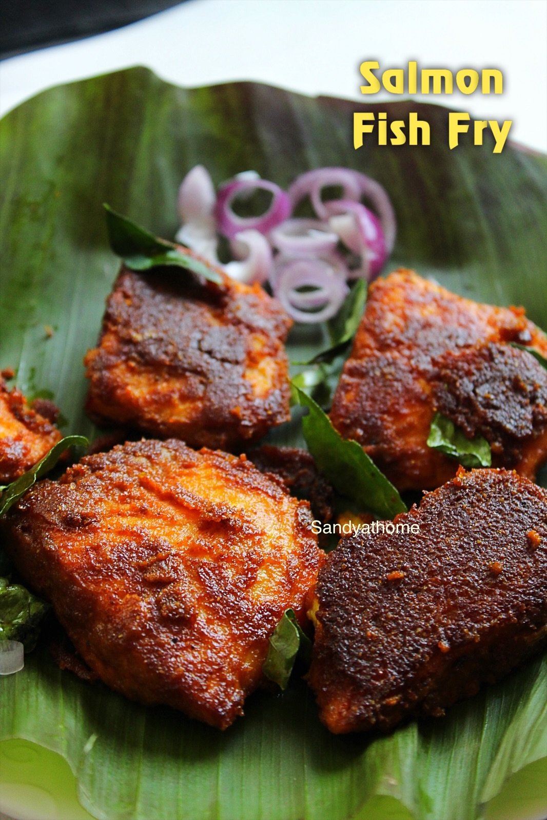 Revival-style south Indian fish fry with salmon, crushed garlic, chili powder, and tamarind juice.