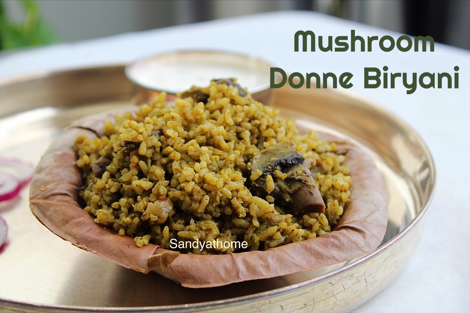 Authentic Bengaluru-style Mushroom Donne Biryani recipe made with seeraga samba rice, mint, coriander, and green masala