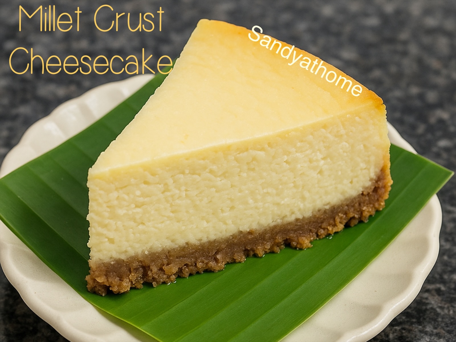 Close-up of a homemade ricotta mascarpone cheesecake slice with ragi jowar wheat biscuit base, lightly scooped with a spoon, styled on a banana leaf for a rustic Indian-inspired dessert presentation.
