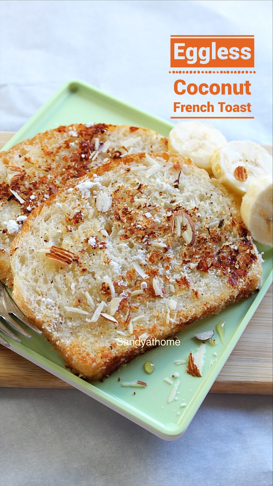 Golden and crispy eggless coconut French toast served for breakfast with tropical fruit and honey