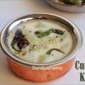 Cucumber Kichadi served in banana leaf as part of Onam Sadya – traditional Kerala yogurt curry with cucumber and coconut
