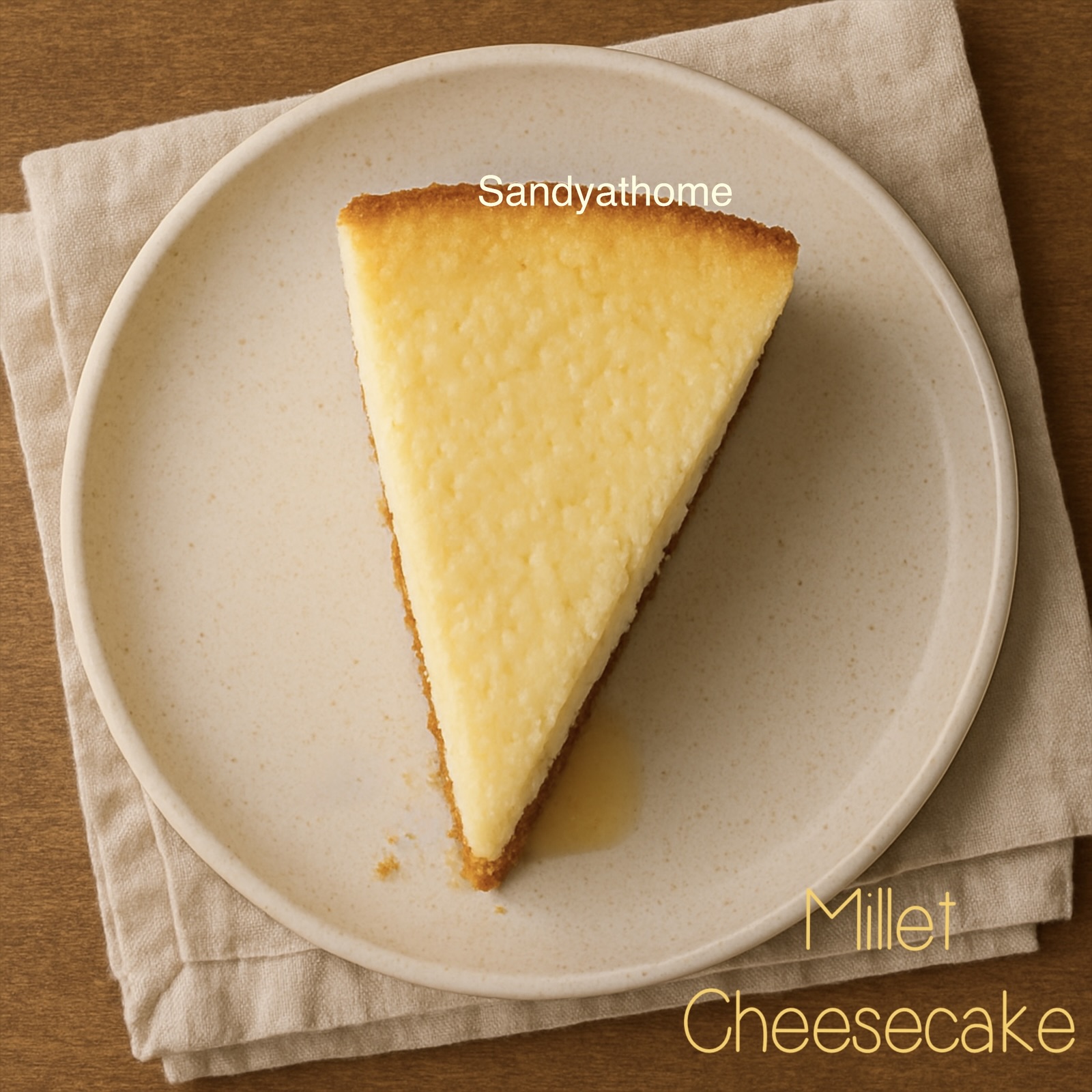 A slice of eggless millet cheesecake made with ricotta and mascarpone, served on a banana leaf over a white fluted plate, showing its baked golden top and crumbly ragi-jowar-wheat biscuit crust.