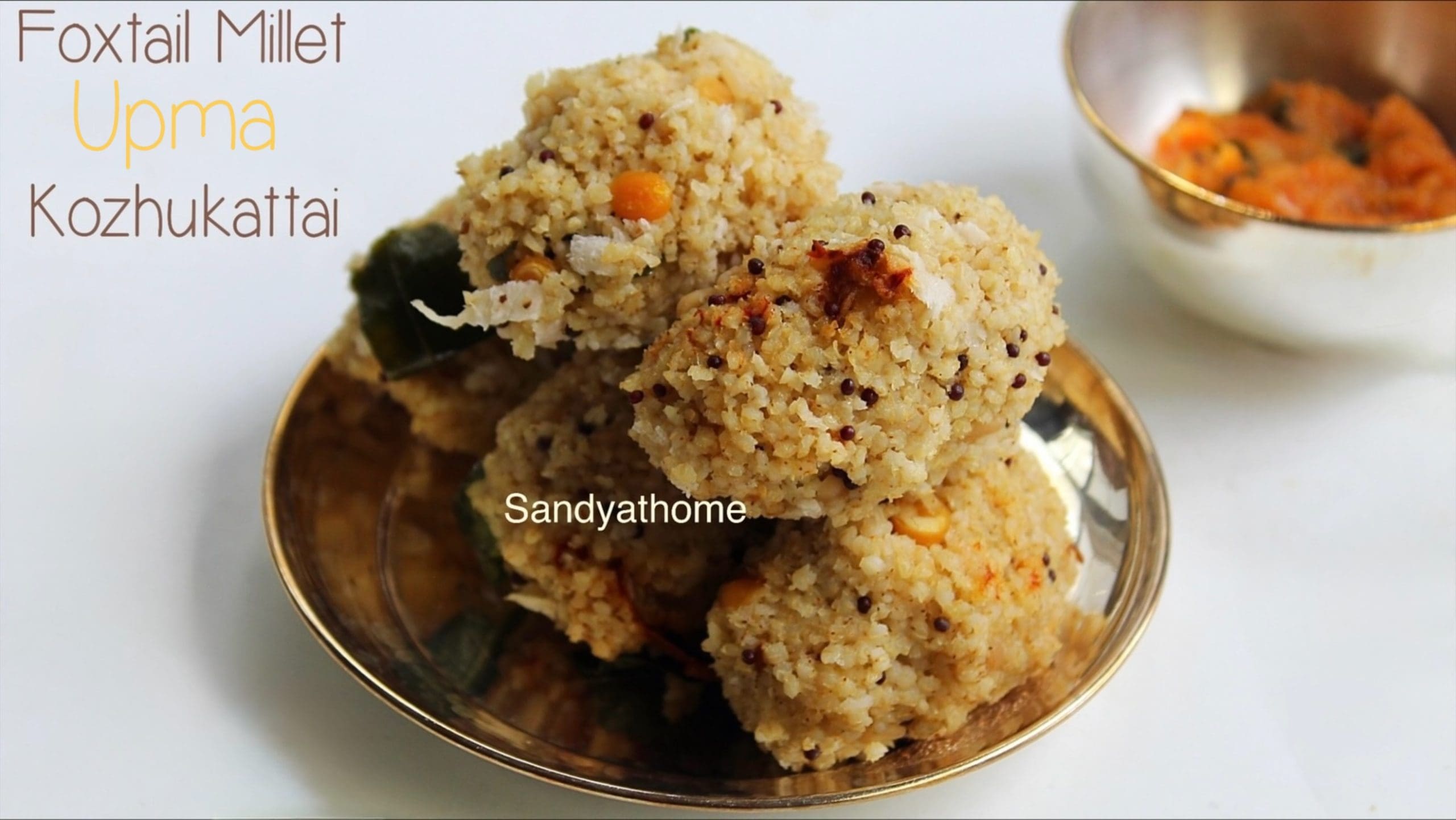 Foxtail millet upma kozhukattai arranged on banana leaf, healthy South Indian breakfast
