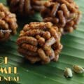 Golden caramel-coated ragi pori urundai with sukku arranged for a festive recipe display.