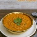 Chettinad-style vegetarian kothu kari kuzhambu served with steamed rice and dosa on banana leaf for traditional South Indian meal