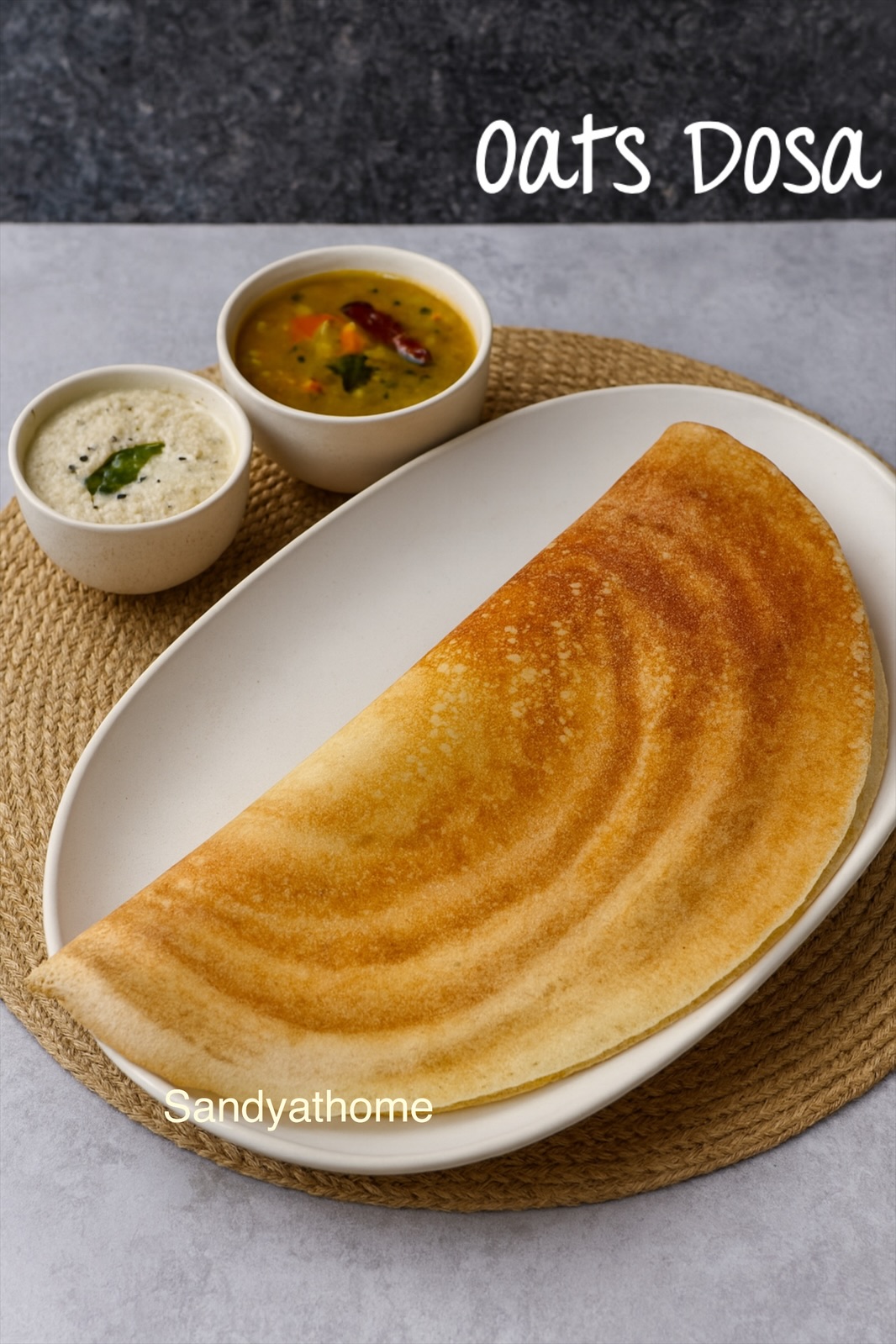 Crispy fermented oats dosa with golden edges served as a gluten-free South Indian meal with chutney and sambar