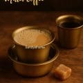 South Indian-style millet latte in a brass davara set, with gentle froth and warm tones, showcasing dairy-free coffee made with Kodo millet milk.