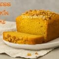 Soft and fluffy homemade pumpkin cake with chopped walnut topping, spiced and baked to perfection.