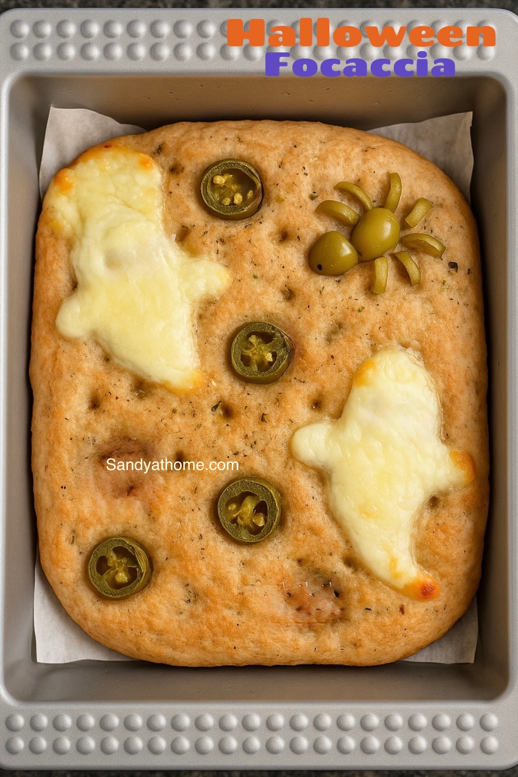 Soft golden focaccia made with 50–50 whole wheat and all-purpose flour, baked for Halloween.