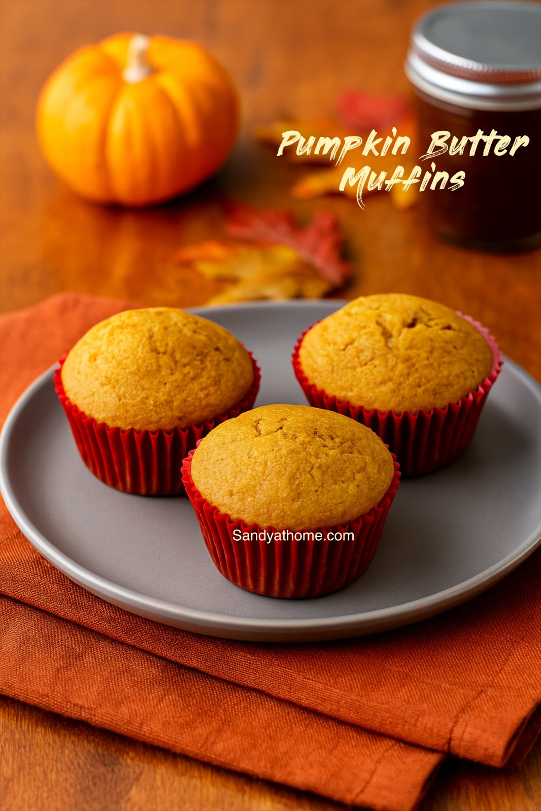 Freshly baked pumpkin butter muffins made with half whole wheat flour, golden and naturally sweet for fall mornings.